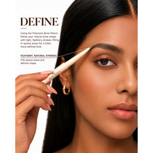 Woman using a Brow Pencil to define her eyebrows with feathery, natural strokes for a fuller shape.