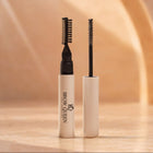 Two Brow Queen eyebrow products on a beige background
