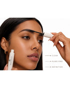 Close-up of a woman applying clear Brow Gel for a flake-free, defined brow look.